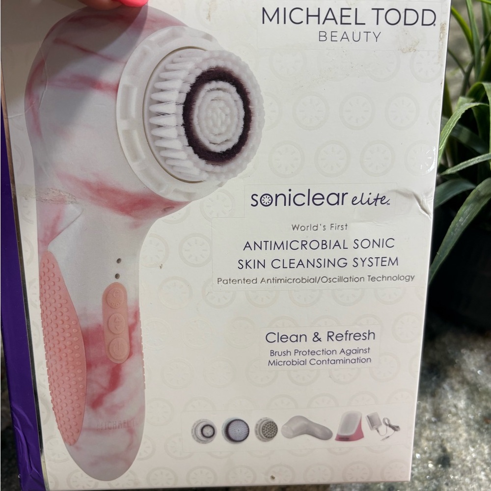 Pink and White Sonic Skincare Tool